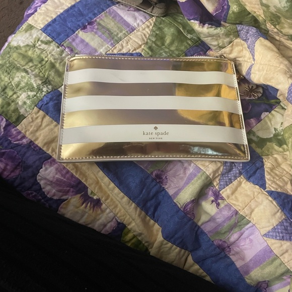 kate spade Handbags - Kate Spade Gold and White Clutch